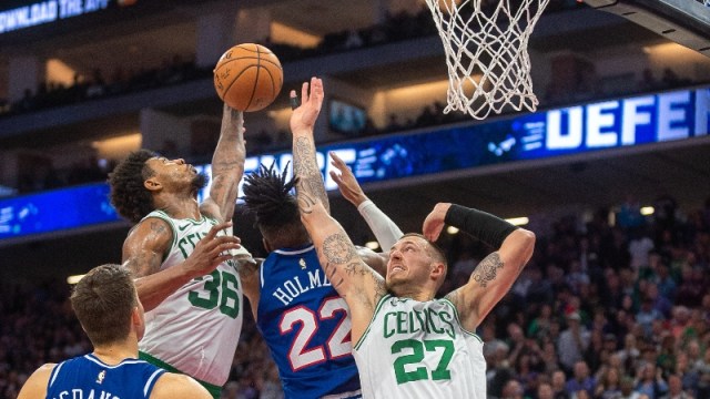 Boston Celtics guard Marcus Smart (36) and center Daniel Theis (27) and Sacramento Kings forward Richaun Holmes (22)