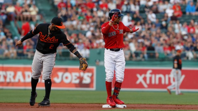 Boston Red Sox right fielder Mookie Betts (50) and Baltimore Orioles second baseman Jonathan Villar (2)