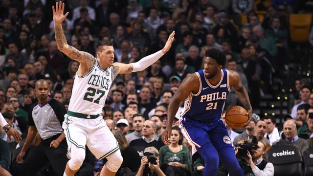 Boston Celtics forward Daniel Theis and Philadelphia 76ers center Joel Embiid