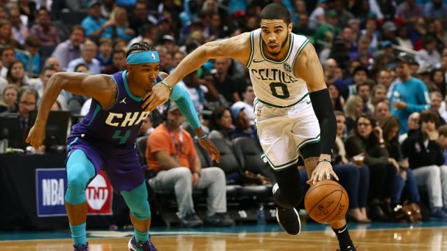 Charlotte Hornets guard Devonte' Graham and Boston Celtics forward Jayson Tatum