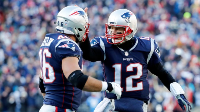 New England Patriots full back James Develin and quarterback Tom Brady