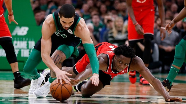 Boston Celtics forward Jayson Tatum (0) and Toronto Raptors forward OG Anunoby (3)