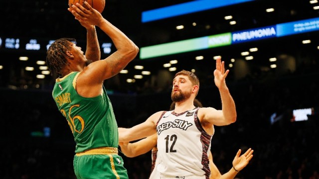 Boston Celtics guard Marcus Smart (36) and Brooklyn Nets guard Joe Harris (12)