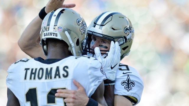 New Orleans Saints quarterback Drew Brees (9) and wide receiver Michael Thomas (13)