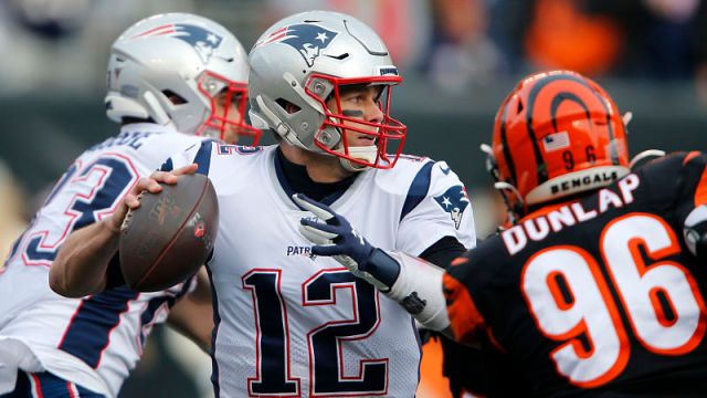 New England Patriots quarterback Tom Brady and Cincinnati Bengals defensive lineman Carlos Dunlap