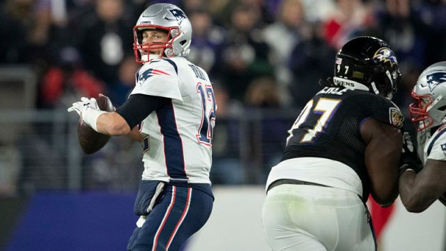 New England Patriots quarterback Tom Brady and Baltimore Ravens defensive tackle Michael Pierce
