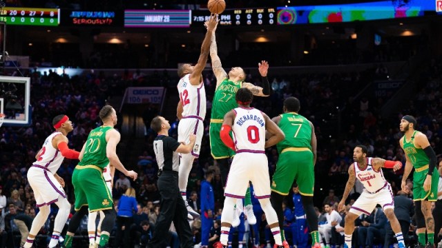 Philadelphia 76ers center Al Horford (42) and Boston Celtics forward Daniel Theis (27)