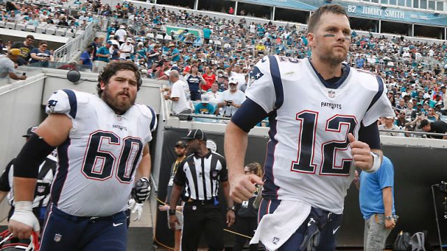 New England Patriots center David Andrews and quarterback Tom Brady