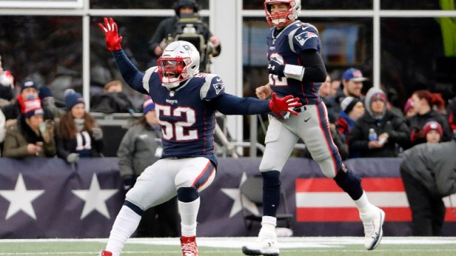 New England Patriots outside linebacker Elandon Roberts (52) and quarterback Tom Brady (12)