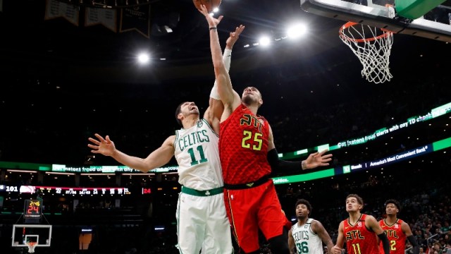 Boston Celtics center Enes Kanter (11) and Atlanta Hawks center Alex Len (25)