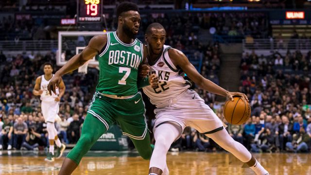 Boston Celtics guard Jaylen Brown and Milwaukee Bucks forward Khris Middleton
