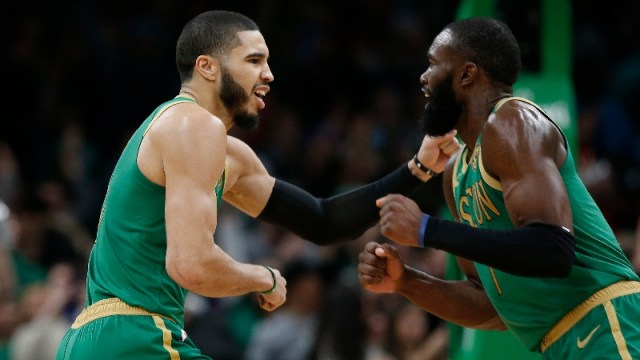 Boston Celtics forwards Jayson Tatum (left) and Jaylen Brown