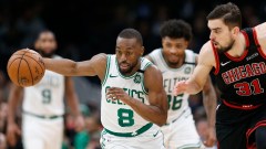 Boston Celtics point guard Kemba Walker (8) and Chicago Bulls guard Tomas Satoransky (31)