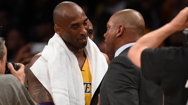 Former Los Angeles Lakers Forward Kobe Bryant And Los Angeles Clippers Head Coach Doc Rivers