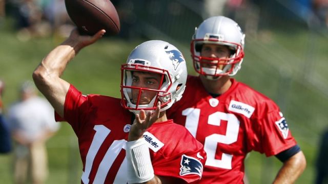New England Patriots quarterback Tom Brady and Jimmy Garoppolo