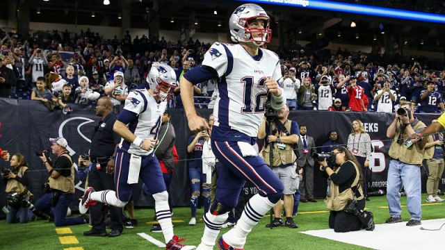 New England Patriots quarterbacks Jarrett Stidham and Tom Brady