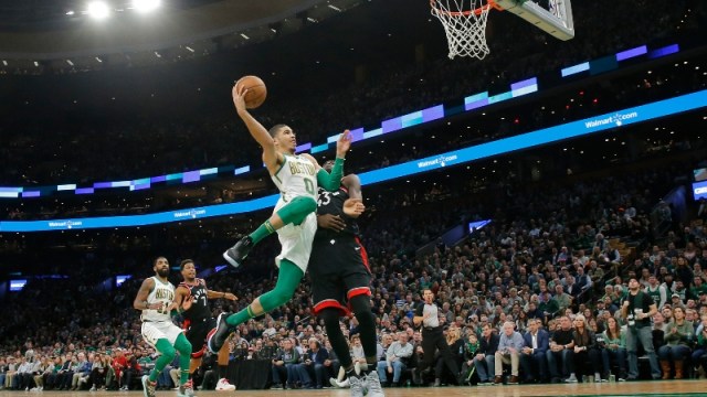 Boston Celtics forward Jayson Tatum (0) and Toronto Raptors forward Pascal Siakam (43)