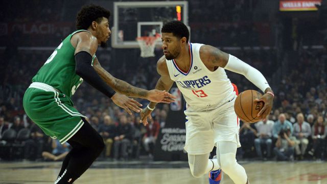 Boston Celtics guard Marcus Smart and Los Angeles Clippers forward Paul George