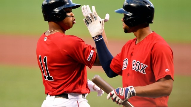 Boston Red Sox third baseman Rafael Devers (11) and shortstop Xander Bogaerts (2)