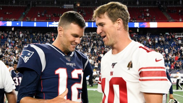 Tampa Bay Buccaneers quarterback Tom Brady and former New York Giants quarterback Eli Manning