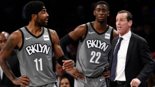 Brooklyn Nets guards Kyrie Irving, Caris LeVert; former Nets head coach Kenny Atkinson