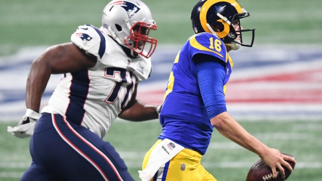New England Patriots defensive tackle Adam Butler and Los Angeles Rams quarterback Jared Goff