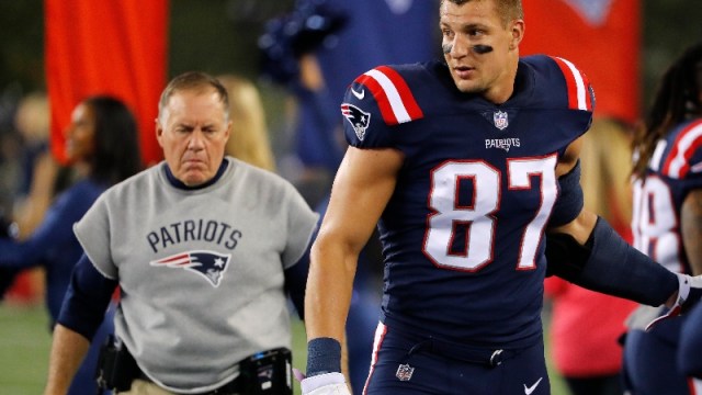 New England Patriots head coach Bill Belichick (left) and Tampa Bay Buccaneers tight end Rob Gronkowski