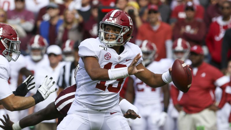 Tua looking like “Alabama Tua” with that red practice jersey 