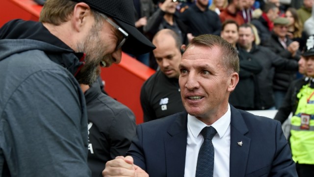Liverpool manager Jurgen Klopp (left) and Leicester City manager Brendan Rodgers