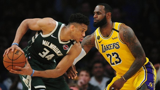Milwaukee Bucks forward Giannis Antetokounmpo (left) and Los Angeles Lakers forward LeBron James