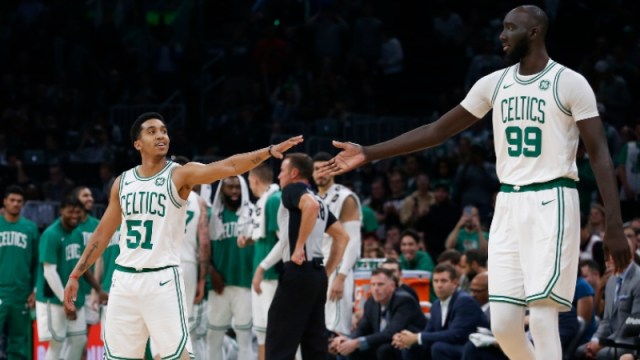 Boston Celtics center Tacko Fall (99) and point guard Tremont Waters (51)