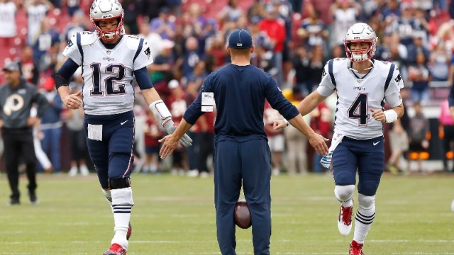 Tampa Bay Buccaneers quarterback Tom Brady (left) and New England Patriots quarterback Jarrett Stidham (right)