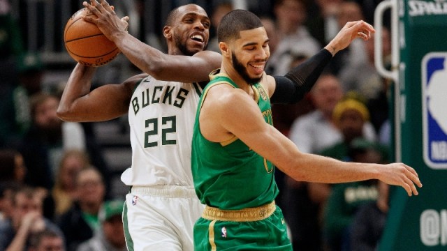 Milwaukee Bucks forward Khris Middleton (22) and Boston Celtics forward Jayson Tatum