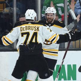 Boston Bruins forwards Jake DeBrusk, David Krejci