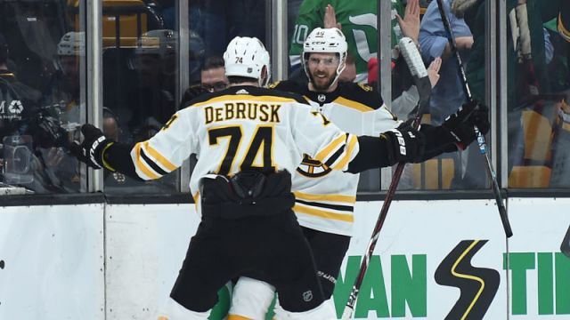 Boston Bruins forwards Jake DeBrusk, David Krejci