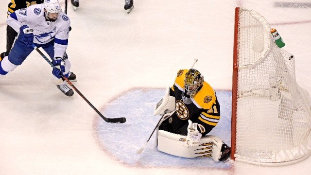 Boston Bruins goaltender Jaroslav Halak (41) and Tampa Bay Lightning center Alex Killorn (17)