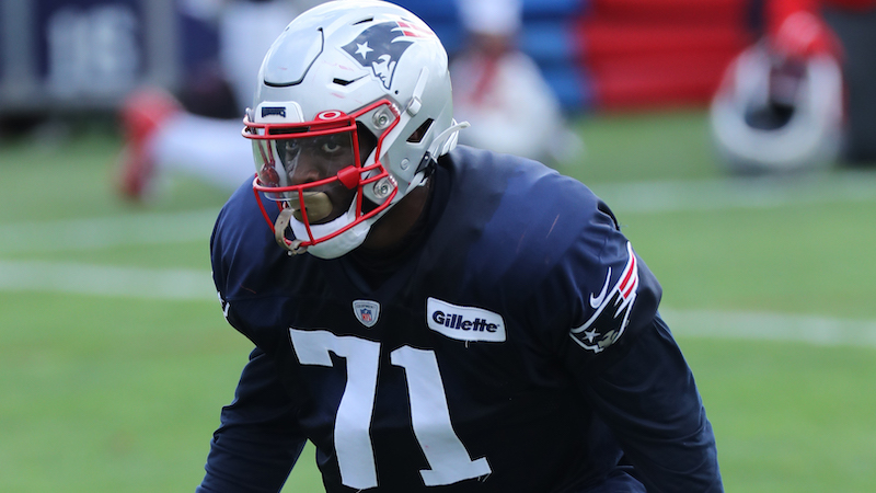 New England Patriots linebacker Josh Uche (55) rides the