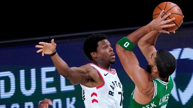 Toronto Raptors guard Kyle Lowry and Boston Celtics forward Jayson Tatum