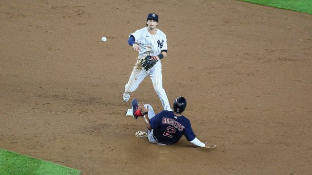 New York Yankees infielder Tyler Wade and Boston Red Sox shortstop Xander Bogaerts