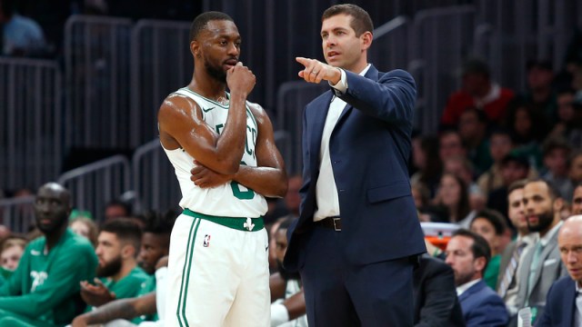 Boston Celtics point guard Kemba Walker and Brad Stevens