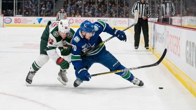 Minnesota Wild forward Kevin Fiala and Vancouver Canucks forward Tanner Pearson