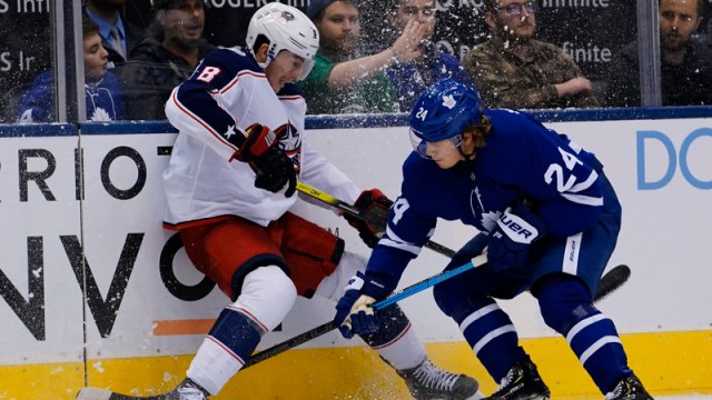 Columbus Blue Jackets defenseman Zack Werenski, Toronto Maple Leafs forward Kasperi Kapanen