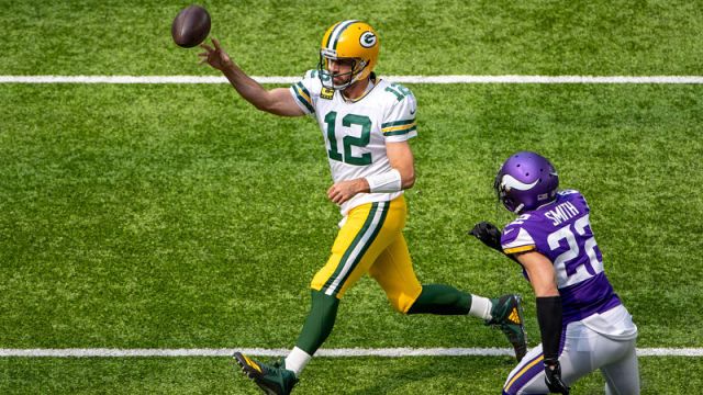 Green Bay Packers quarterback Aaron Rodgers and Minnesota Vikings safety Harrison Smith