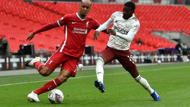 Liverpool midfielder Fabinho (left) and Arsenal forward Nicolas Pepe