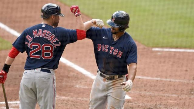 Boston Red Sox designated hitter J.D. Martinez, Boston Red Sox shortstop Xander Bogaerts