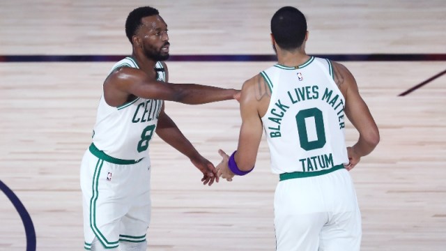 Boston Celtics guard Kemba Walker (8) and forward Jayson Tatum (0)