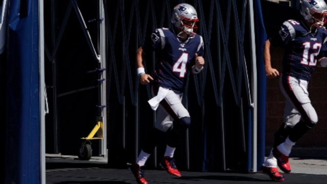 New England Patriots quarterback Jarrett Stidham (4) and former QB Tom Brady