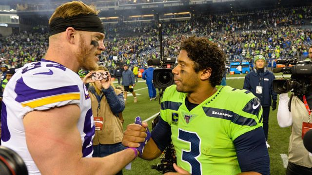 Minnesota Vikings tight end Kyle Rudolph and Seattle Seahawks quarterback Russell Wilson