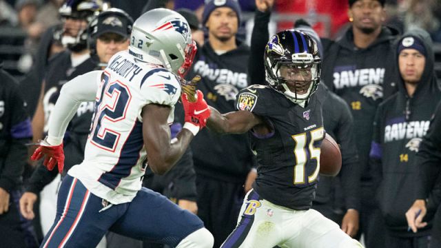 New England Patriots safety Devin McCourty and Baltimore Ravens wide receiver Marquise Brown