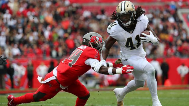 Tampa Bay Buccaneers safety Mike Edwards and New Orleans Saints running back Alvin Kamara